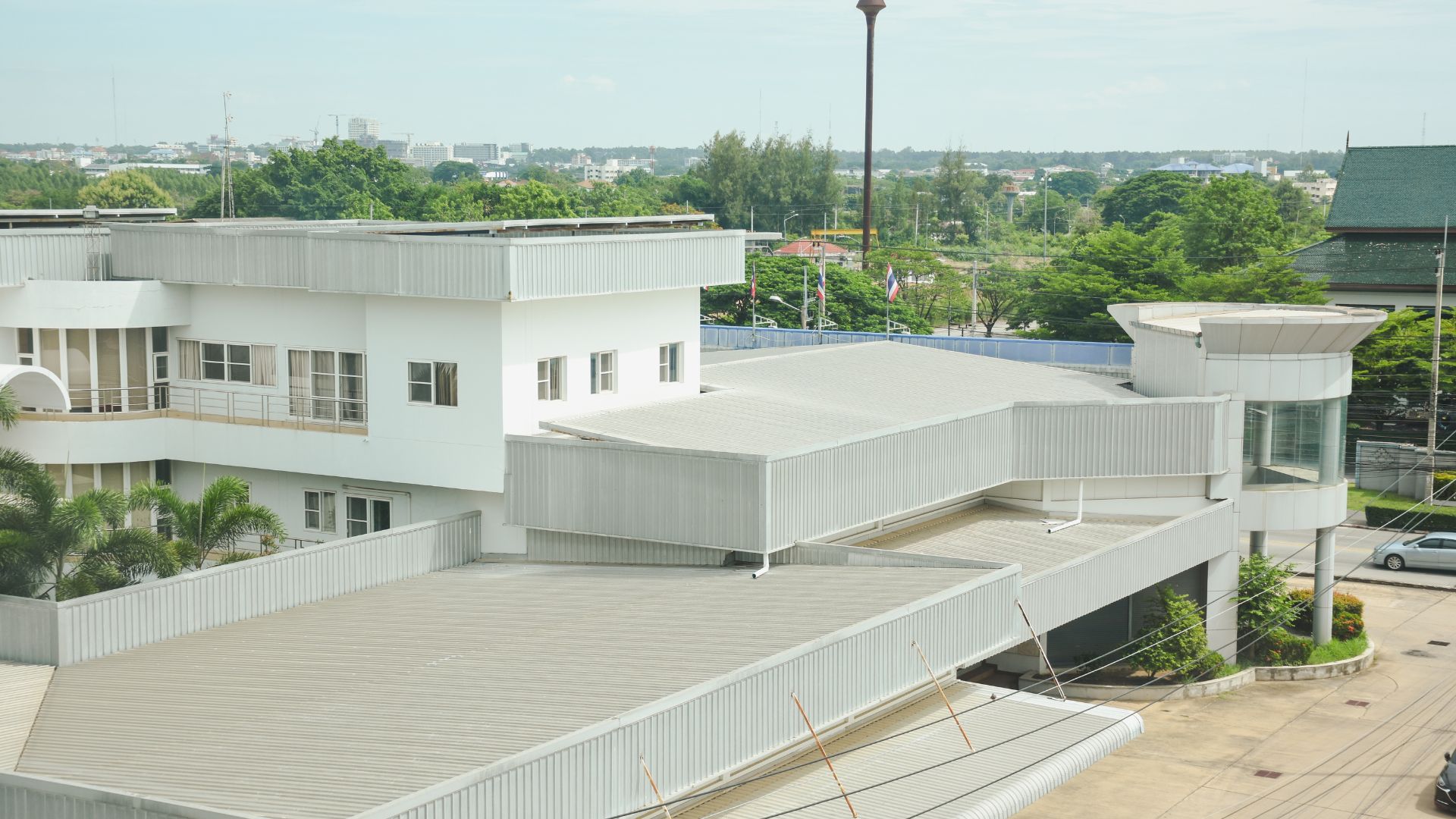 White commercial building with a flat roof