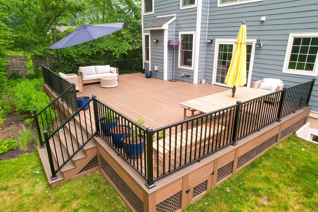 Composite deck with railings and patio furniture