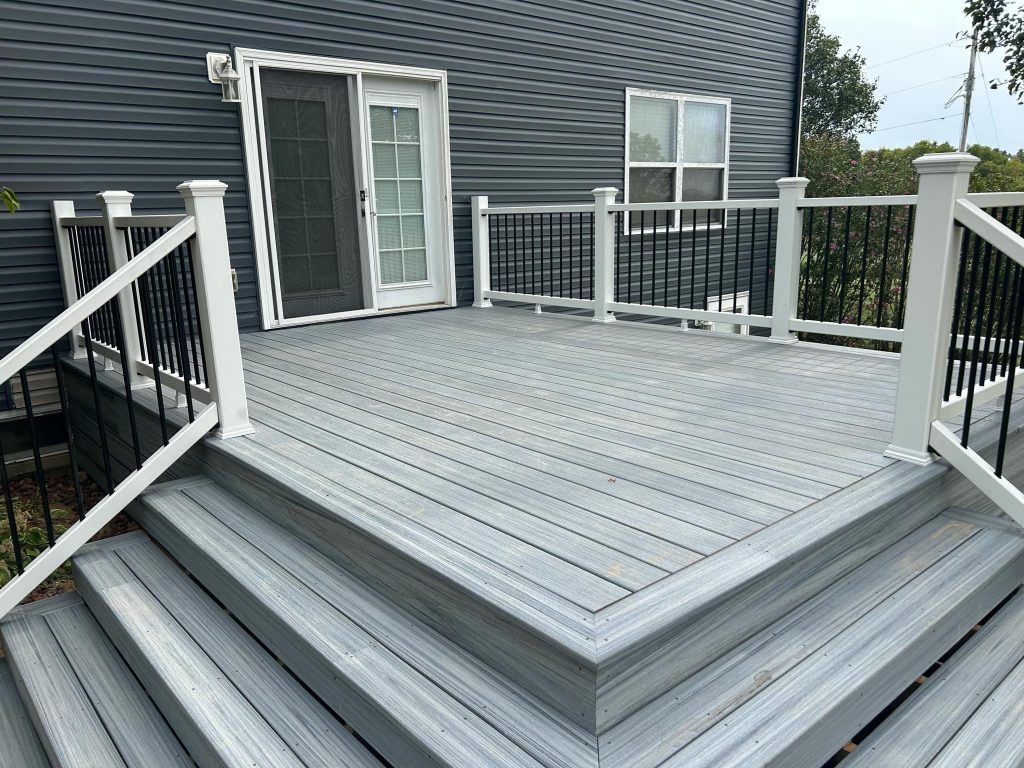 Composite deck with white and black railings